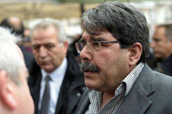 Salih Muslim, chairman of the PYD, arrives on November 17, 2015 to pay tribute to the victims of the Paris attacks