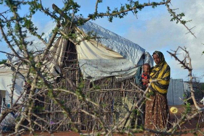 A Somali refugee woman with her child at Kenya's Dadaab refugee camp