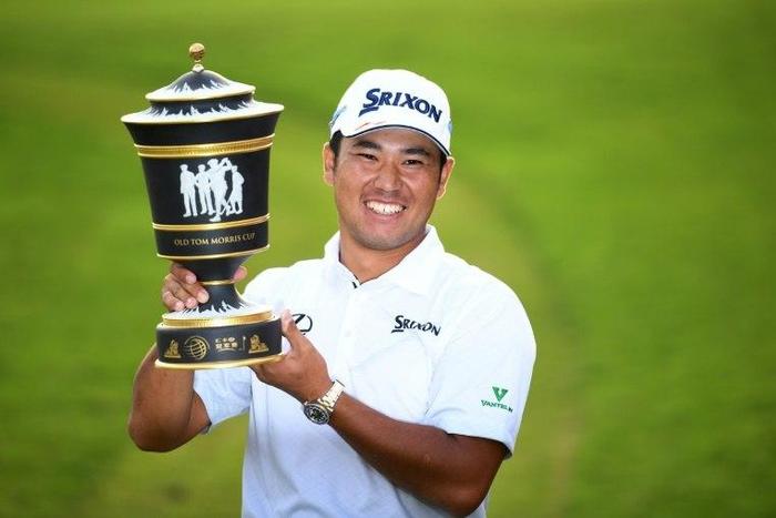 Hideki Matsuyama of Japan poses with the winner's trophy after the final round of the World Golf Championships-HSBC Champions tournament, in Shanghai, on October 30, 2016