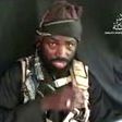 Boko Haram leader Abubakar Shekau makes a statement at an undisclosed location in video released on YouTube by Islamist group