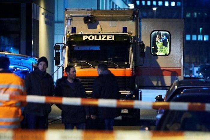 A police vehicle is parked outside a Muslim prayer hall in Zurich after a shooting incident on December 19, 2016