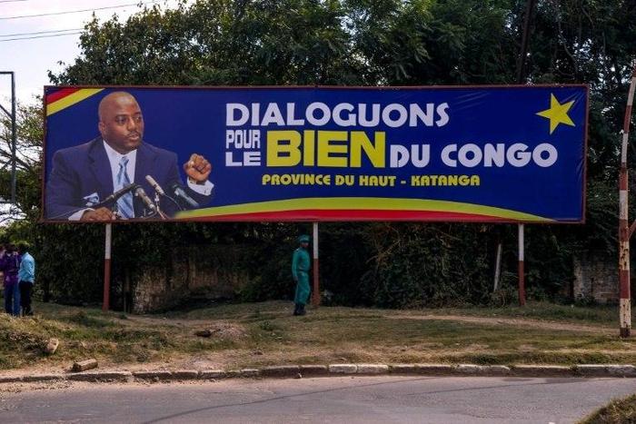 On a billboard in Lubumbashi, President Joseph Kabila urges "Let's talk for the good of the Congo"