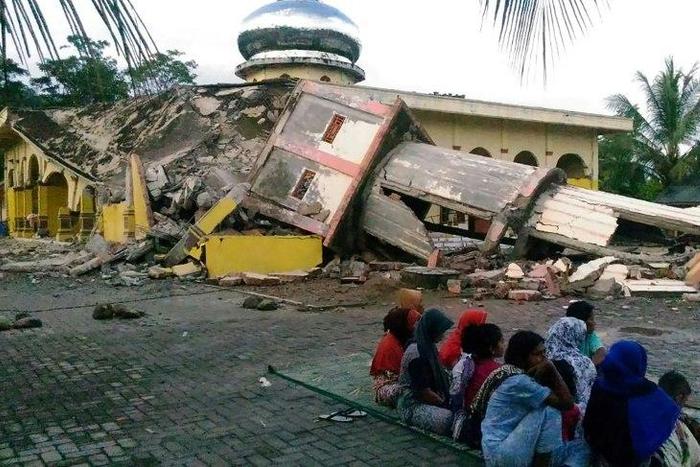 Dozens have died as a 6.5-magnitude earthquake strikes western Indonesia