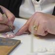 In a small village in eastern France two sisters are doggedly holding out against the trend towards mass produced charms for the traditional "Galette des Rois" cake