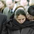 Mazarine Pingeot -- the daughter of former French president Francois Mitterrand -- is comforted by her mother Anne Pingeot, during her father's 1996 funeral in Jarnac