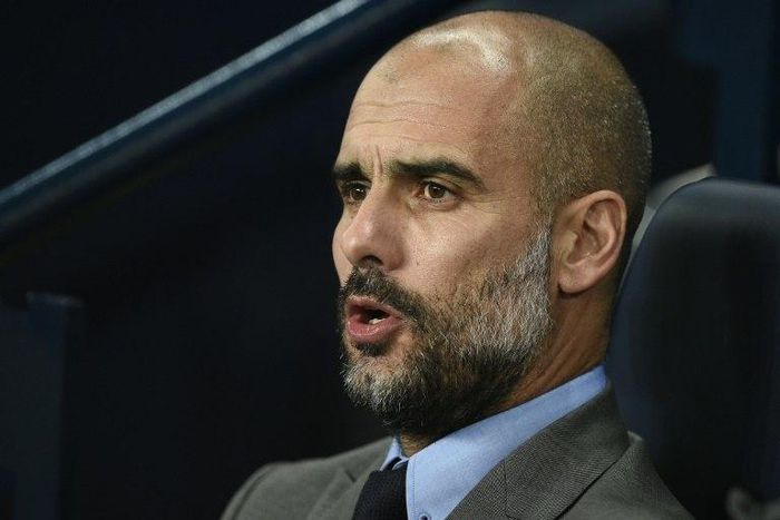 Manchester City's Spanish manager Pep Guardiola watches during their match against Barcelona at the Etihad Stadium in Manchester, north west England on November 1, 2016