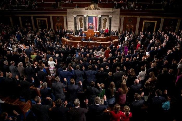 Speaker of the House Paul Ryan (C) swears in the newly elected members of the House of Representatives during the opening of the 115th US Congress on January 3, 2017