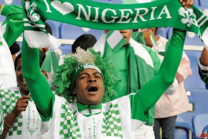 An illustrative photo of a Nigerian football fan cheering the Super Eagles