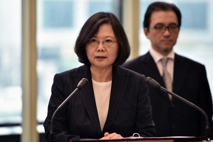 Taiwan President Tsai Ing-wen (left) speaks before departing from Taoyuan airport on January 7, 2017