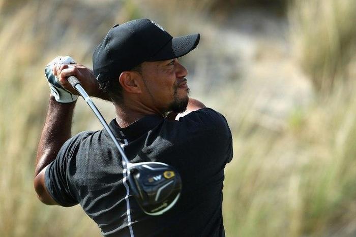 Tiger Woods of the United States hits a tee shot on the third hole during round one of the Hero World Challenge at Albany, The Bahamas on December 1, 2016