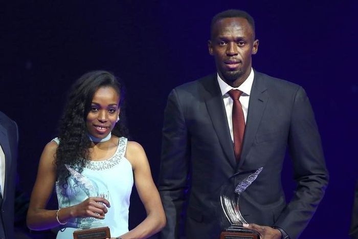 Usain Bolt of Jamaica (R) and Almaz Ayana of Ethiopia pose with their awards after being elected male and female World Athlete of the Year 2016 in Monaco, December 2, 2016.  REUTERS/Eric Gaillard
