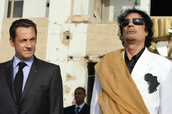 Nicolas Sarkozy (left) was welcomed by Moamer Kadhafi during a 2007visit to the Libyan capital Tripoli