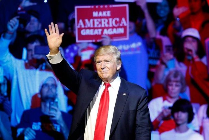 Republican presidential candidate Donald Trump waves to the crowd during a campaign rally at the US Bank Arena on October 13, 2016 in Cincinnati, Ohio