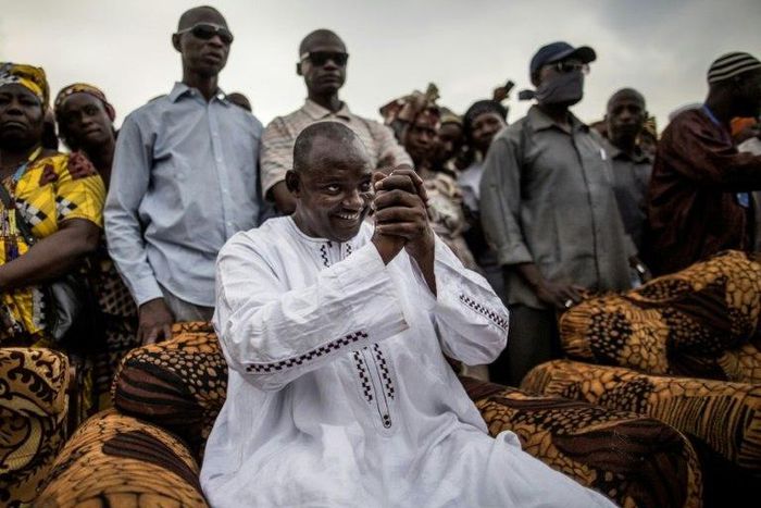 Gambian President-elect Adama Barrow greets supporters during a gathering on November 29, 2016
