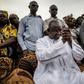 Gambian President-elect Adama Barrow greets supporters during a gathering on November 29, 2016