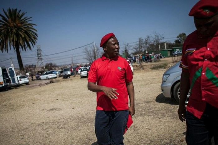 South African opposition leader Julius Malema arrives to give a press briefing in Johannesburg, South Africa