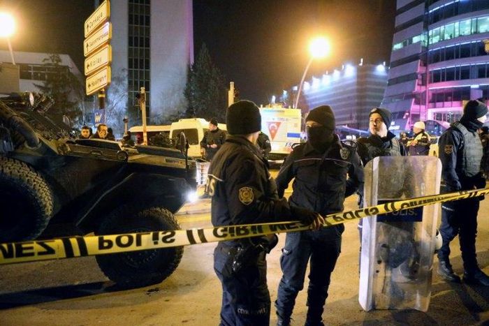 Turkish soldiers and policemen stand guard near the Cagdas Sanatlar Merkezi, a major art exhibition hall, where Andrei Karlov, the Russian ambassador to Ankara, was shot dead on December 19, 2016