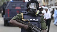 Masked Nigerian Police officer