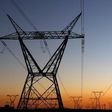 Electricity pylons carry power from Cape Town's Koeberg nuclear power plant, South Africa. REUTERS/Mike Hutchings