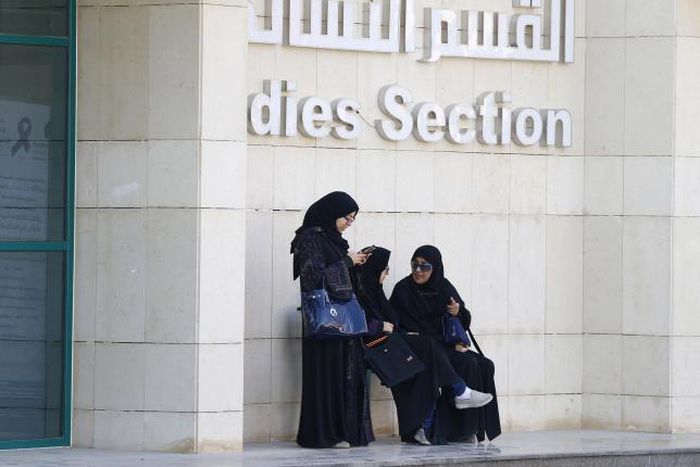 Women rest after casting their votes at a polling station during municipal elections, in Riyadh, Saudi Arabia December 12, 2015.