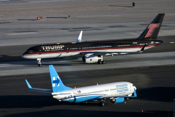 Republican presidential nominee Donald Trump's plane passes Democratic presidential nominee Hillary Clinton's campaign plane at McCarran International Airport, in Nevada, on October 18, 2016