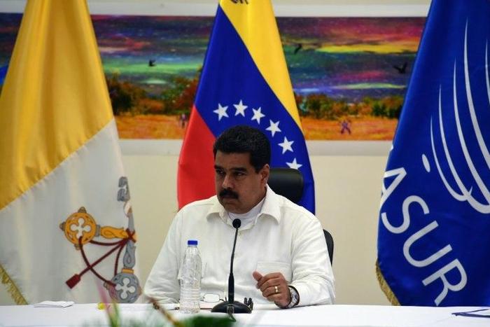 Venezuela's President Nicolas Maduro is pictured during a meeting between Venezuela's government and opposition leaders for Vatican-backed talks, in a bid to settle the country's deepening political crisis, in Caracas on October 30, 2016
