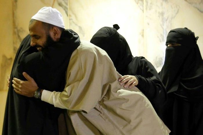 A former Yemeni inmate, released from the US military prison in Guantanamo Bay, is welcomed by his family upon his arrival in Riyadh on January 5, 2017