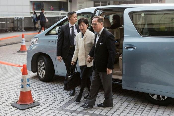 Hong Kong's former chief executive Donald Tsang arrives at the High Court with his wife Selina Tsang on the first day of his corruption trial