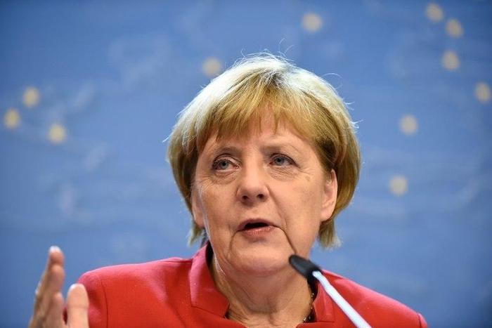 German Chancellor Angela Merkel says Turkey's arrests of opposition newspaper journalists are "highly alarming"