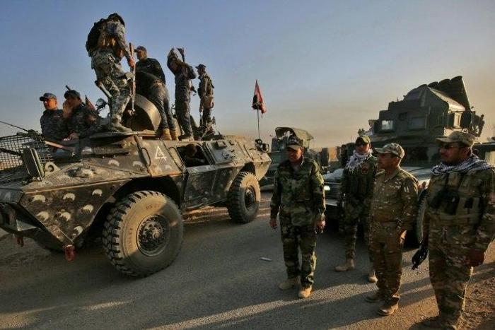 Iraqi forces gather near al-Shourah before launching an offensive to retake Mosul from the Islamic State (IS) group