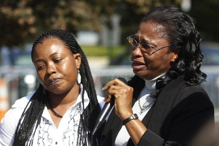 FILE PHOTO - Plaintiff Esther Kiobel (R) speaks during a protest against Royal Dutch Shell Petroleum in front of the U.S. Supreme Court in Washington October 1, 2012.