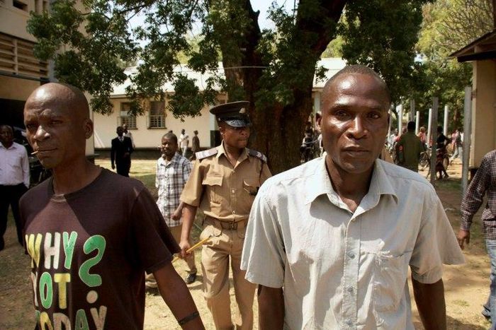 Eric Aniva (right) was paid to have sex with bereaved widows to exorcise evil spirits