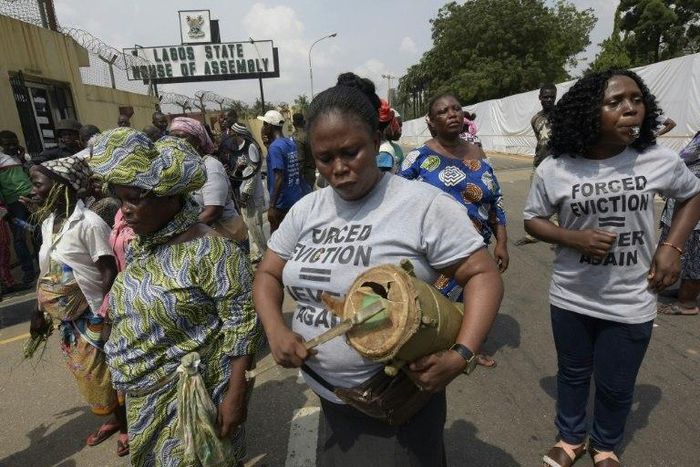 Some 2,000 of people, including women and children, trekked to state Governor Akinwumi Ambode's office, barricading its doors and saying they planned to rally until their demands were met
