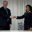 Google Executive Chairman Eric Schmidt (L) and Cuban national telecom provider (ETECSA) president executive Mayra Arevich shake hands after the signing of a bilateral agreement in Havana, on December 12, 2016