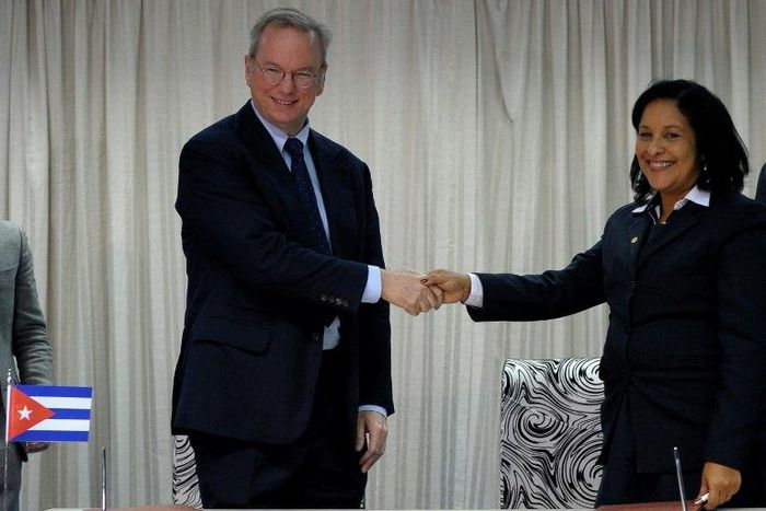 Google Executive Chairman Eric Schmidt (L) and Cuban national telecom provider (ETECSA) president executive Mayra Arevich shake hands after the signing of a bilateral agreement in Havana, on December 12, 2016