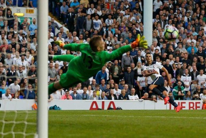 Sunderland goalkeeper Jordan Pickford saves a shot by Erik Lamela in a Premier League match against Tottenham Hotspur at White Hart Lane on September 18, 2016