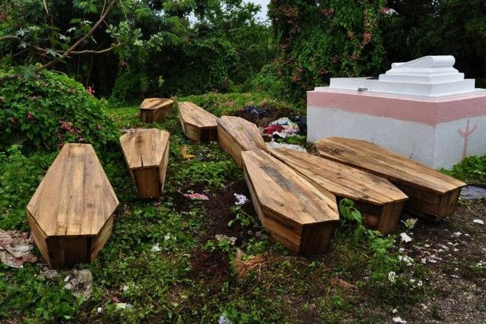 Caskets of victims of violence in in Kingston's May Pen Cemetery in 2010