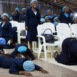 Women praying in a church