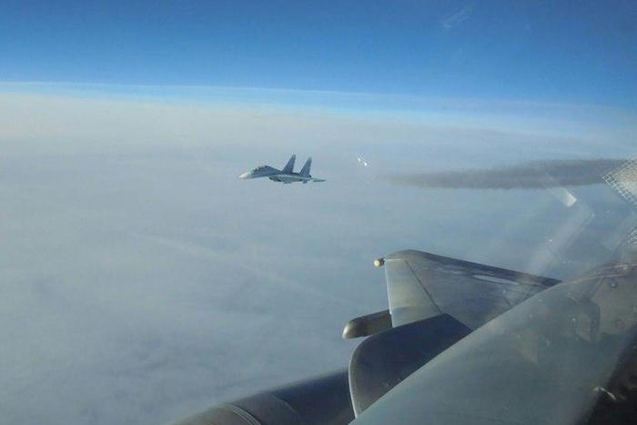 Undated picture released on December 15, 2016 by the French military account @EtatMajorFR shows a Russian jet being intercepted by a French Mirage jet in Baltic Sea air space above Lithuania