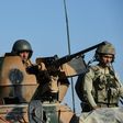 Turkish soldiers stand in a Turkish army tank driving back to Turkey from the Syrian-Turkish border town of Jarabulus on September 2, 2016 in the Turkish-Syrian border town of Karkamis