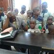 Pastor Onoyngu Chibuike appears sober in a picture of him and the children.