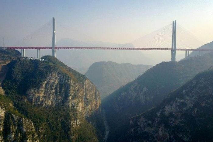 The Beipanjiang Bridge, near Bijie in Guizhou is the world's highest and connects the province with Yunnan, reducing travel time by three-quarters