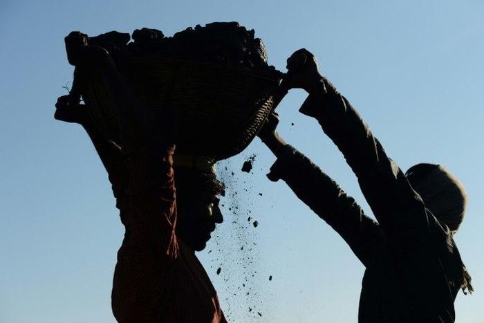 The collapse of a coal mine in eastern India has left around a dozen workers trapped