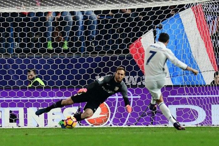 Real Madrid's Cristiano Ronaldo takes a penalty during their match against Atletico de Madrid on November 19, 2016