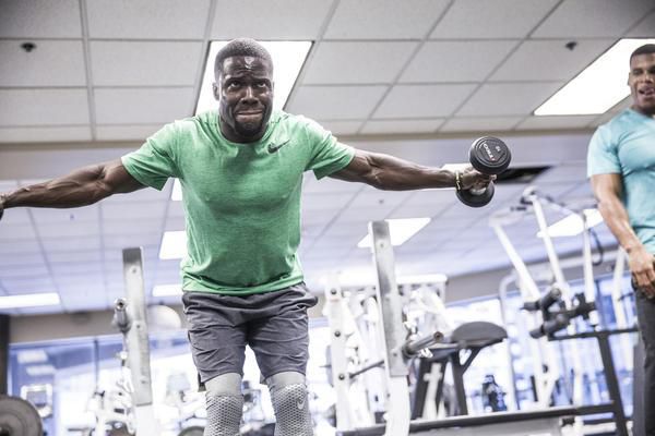 Kevin Hart working out in the gym