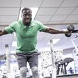 Kevin Hart working out in the gym