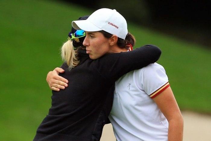 Sarah Jane Smith of Australia and Carlota Ciganda of Spain embrace after they finish their round on the 18th hole during the first round of the Citibanamex Lorena Ochoa Invitational Presented By Aeromexico and Delta at Club de Golf Mexico