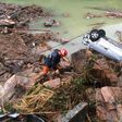 Rescuers pull 15 out from China landslide, 32 missing