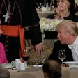 Democratic presidential nominee Hillary Clinton (L) and Republican nominee Donald Trump talk during the Alfred E. Smith Memorial Foundation Dinner at Waldorf Astoria in New York on October 20, 2016