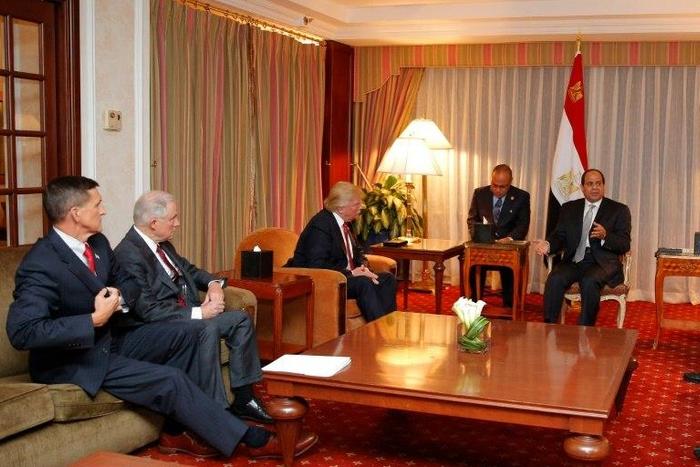 (L-R) General Michael Flynn (Ret), Senator Jeff Sessions, and Donald Trump look on as Egyptian President Abdel Fattah el-Sisi speaks during a meeting in New York